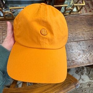 Lululemon Athletica Vibrant Autumn orange baller Cap NWOT ONE SIZE UNISEX